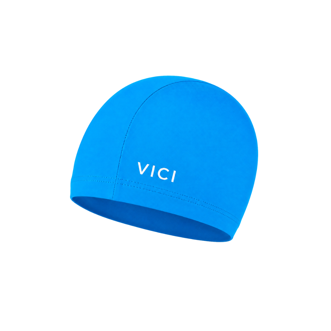 A bright blue swim cap made from lycra