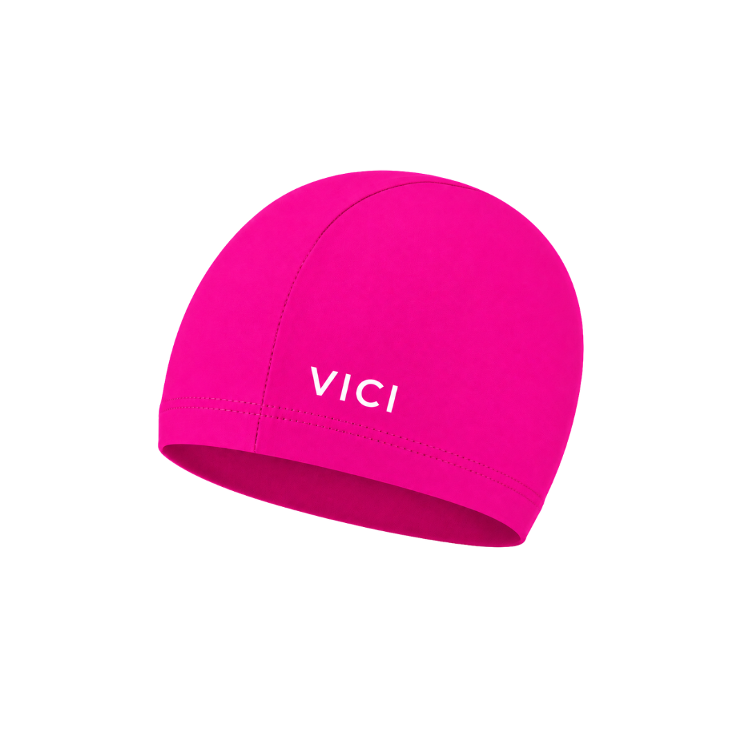 A bright pink swim cap made from Lycra - Designed for smaller kids but fits all ages